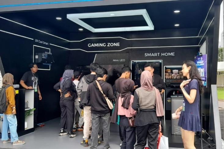 Bagi fans yang hadir langsung, suasana di area turnamen kini semakin hidup. Foto: Novi